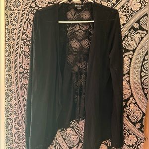 Maite Perroni black lace back cardigan